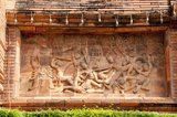 This stone relief at the Chamathewi statue shows the repopulation of Lamphun in the 19th century.<br/><br/>


Lamphun was the capital of the small but culturally rich Mon Kingdom of Haripunchai from about 750 AD to the time of its conquest by King Mangrai (the founder of Chiang Mai) in 1281.<br/><br/>

Lamphun became famous after the enthronement of Queen Chama Thewi (Chamadevi), probably during the late 9th or early 10th century AD. The Lan Na chronicles, verified where possible by archaeology and other corroborative texts, suggest that the foundations of the Kingdom of Haripunchai were laid at Lamphun by a group of Buddhist monks from Lopburi some time in the 8th or 9th century AD. These monks asked the Mon king of Lopburi to provide them with a ruler for their city, and he sent his daughter, Chama Thewi, who arrived in Lamphun accompanied by a large retinue of Mon retainers.<br/><br/>

The new queen was a woman of strong character, who tenaciously defended the interests of Haripunchai against the local Lawa people, and actively promoted Buddhism in the region. She founded a dynasty that was to last until the mid-11th century, and established her capital, Lamphun, as an important centre of Mon culture and influence. 