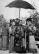 China: Empress Dowager Cixi (1835-1908) with court attendants c. 1905.
